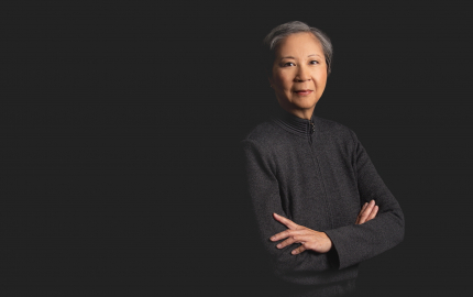 Marian C. Hwang is wearing a dark dress.