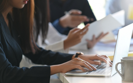 Business people working together with computer laptop