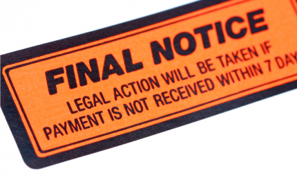 Orange sticker with black writing that says FINAL NOTICE Legal action will be taken if payment is not received within 7 days